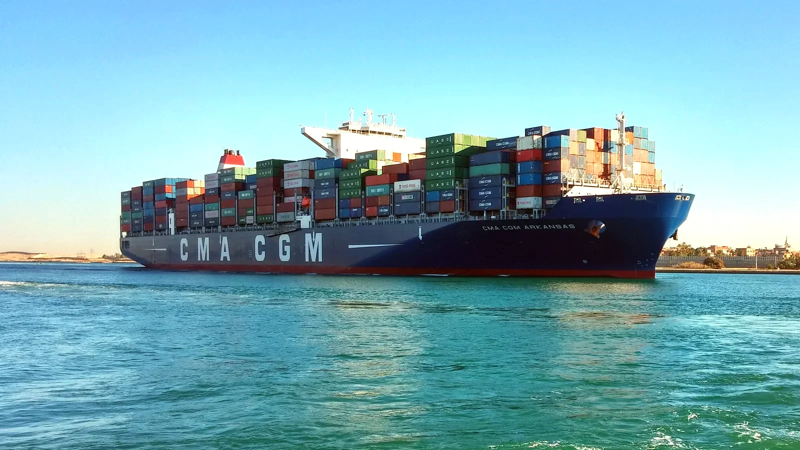 Loaded container ship transiting the Suez Canal near Ismailia