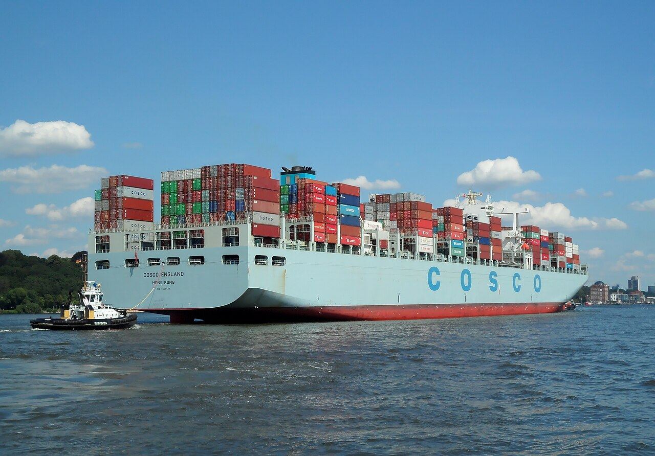 Container ship COSCO England arriving in the port of Hamburg